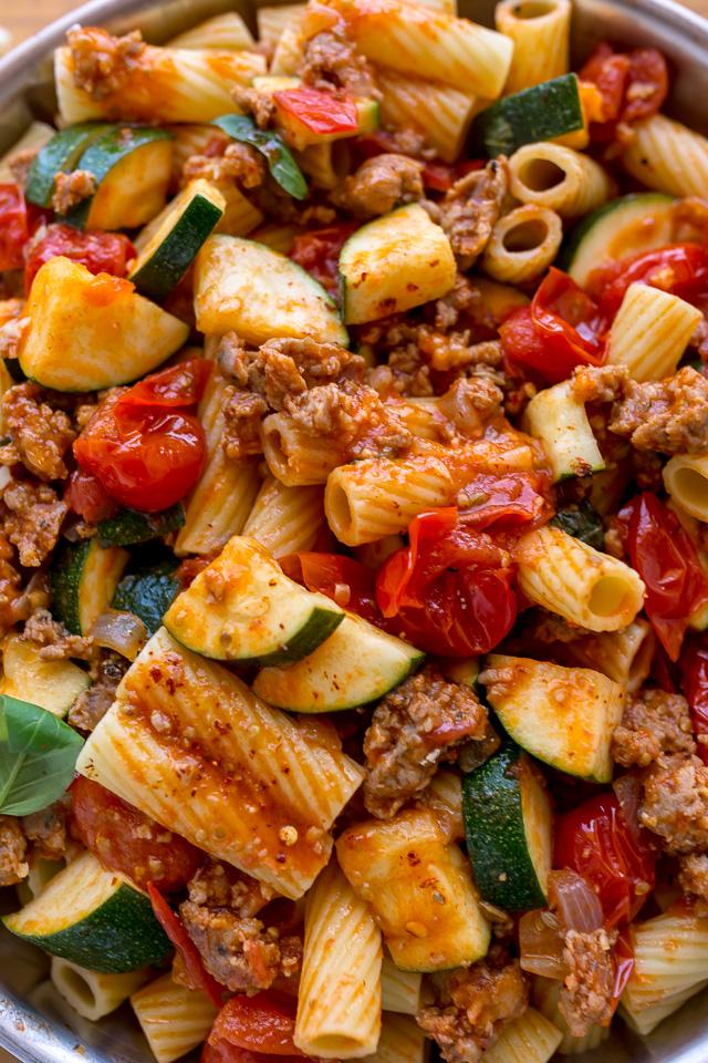 Pan of sausage rigatoni on a table.