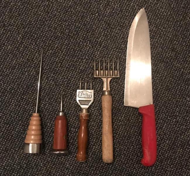 assorted ice saws and ice picks