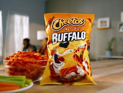 A bag of Cheetos Crunchy Buffalo next to a bowl of Cheetos Crunchy Buffalo.