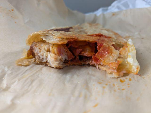Cross-section of Taco Bell's Caliente Cantina Chicken Crispy Taco.