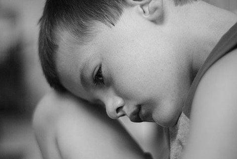 autistic child resisting affection