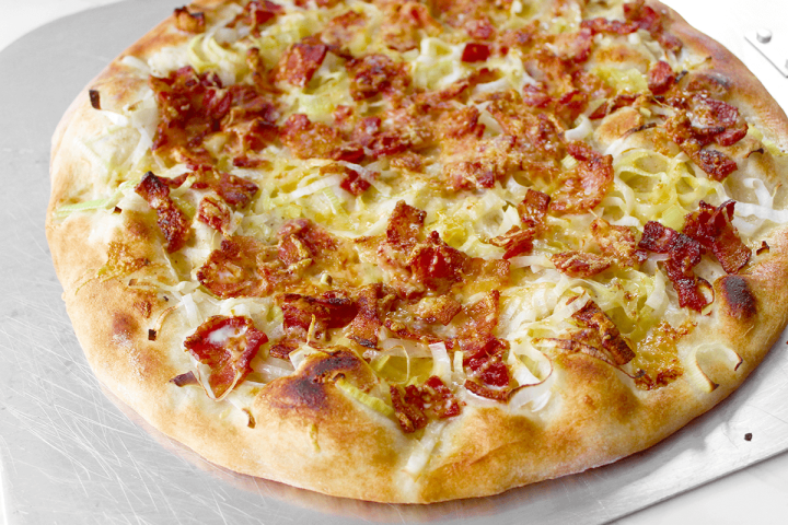 white pizza with bacon hot out of the oven