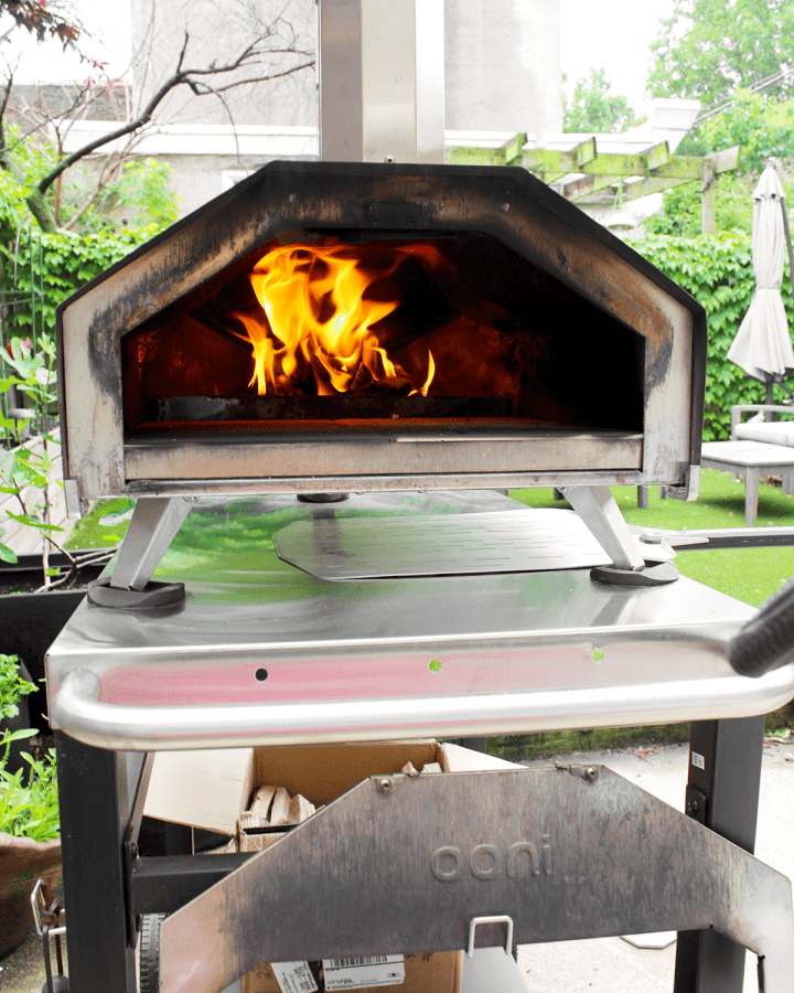 ooni pizza oven with fire lit