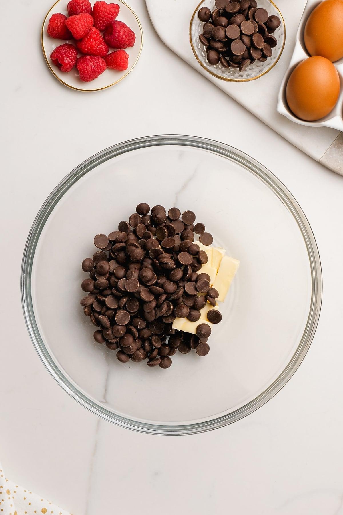 molten lava cake 2 butter and chocolate chips in glass bowl