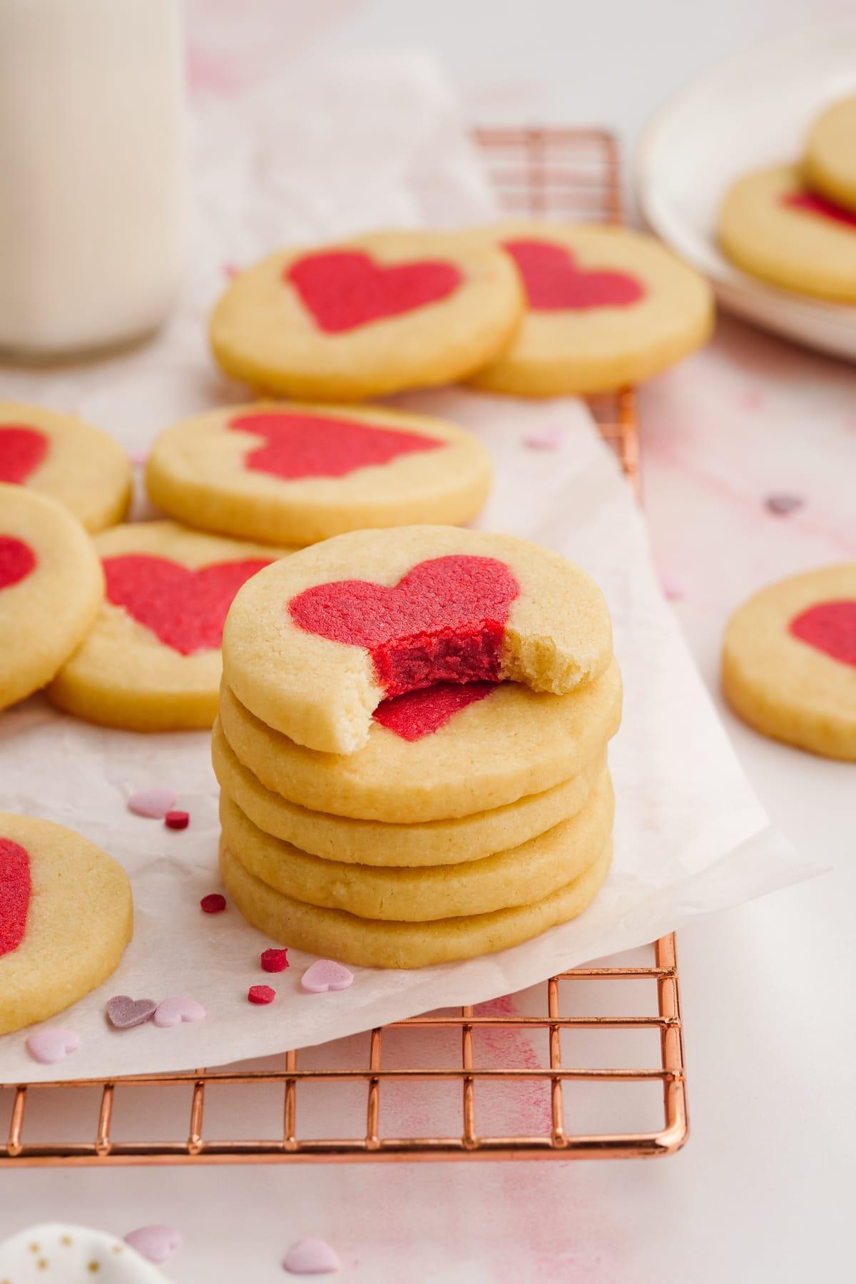 valentines day cookies 27 stacked valentines cookies, top cookie has a bite missing