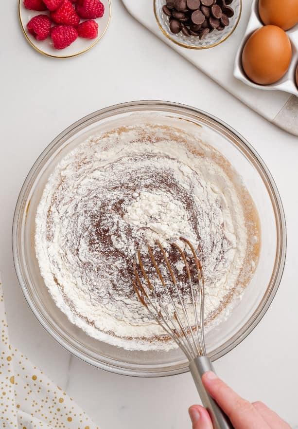 molten lava cake 7 min min molten lava cake ingredients in glass bowl with whisk