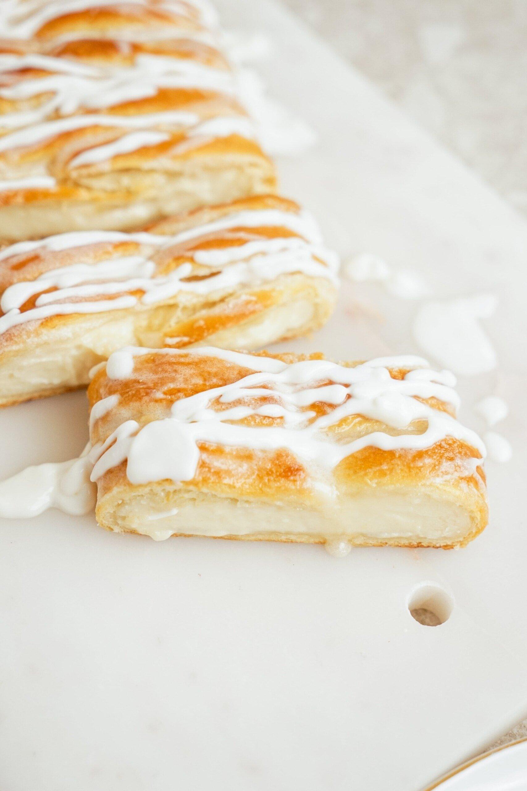 Cheese Danish cut and styled on a plate