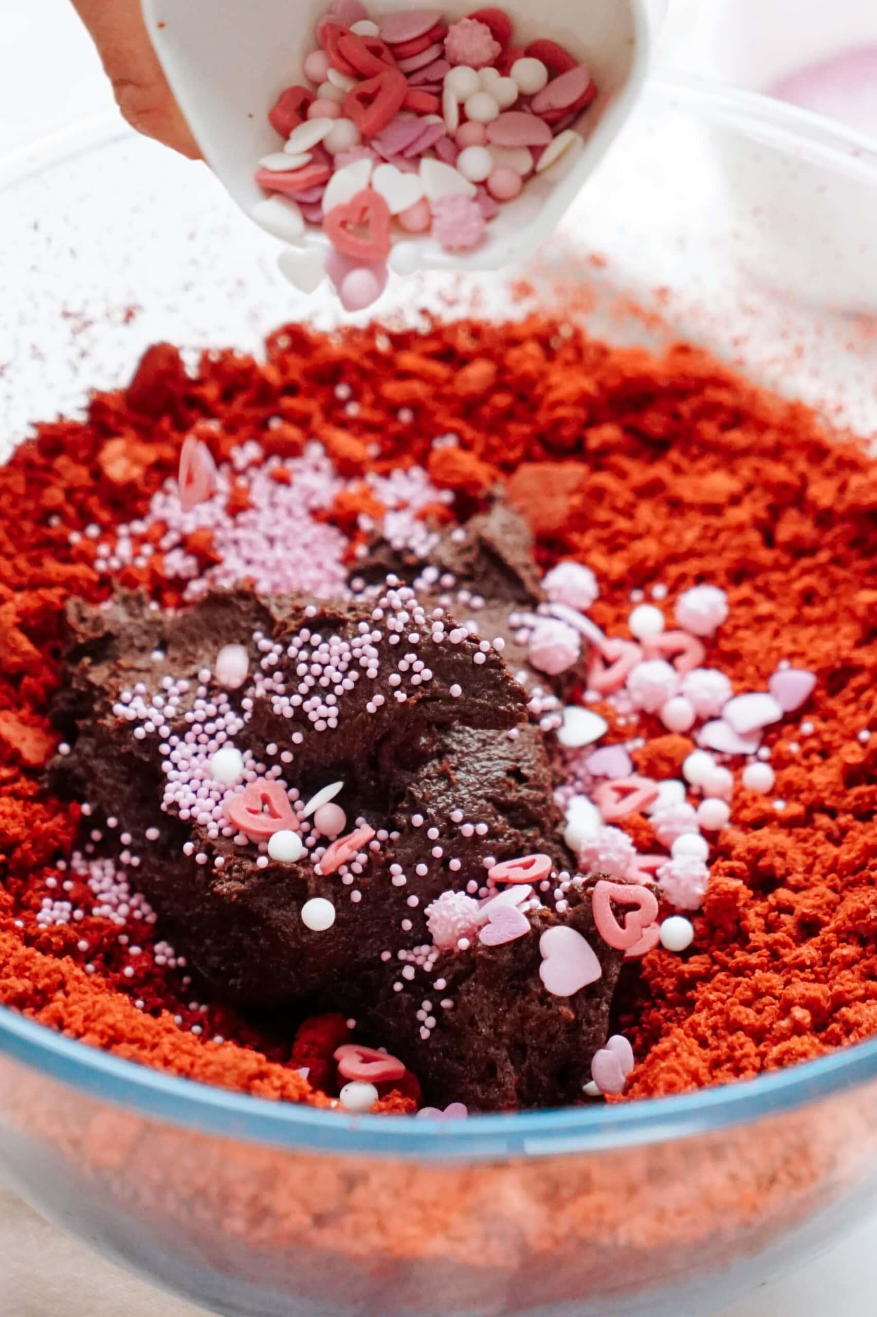 sprinkles added to cake crumbles and chocolate frosting