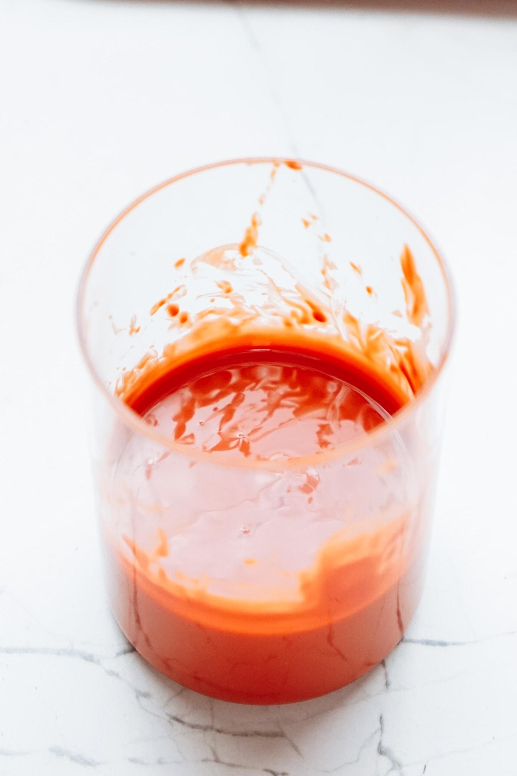 melted chocolate wafers in a glass cup