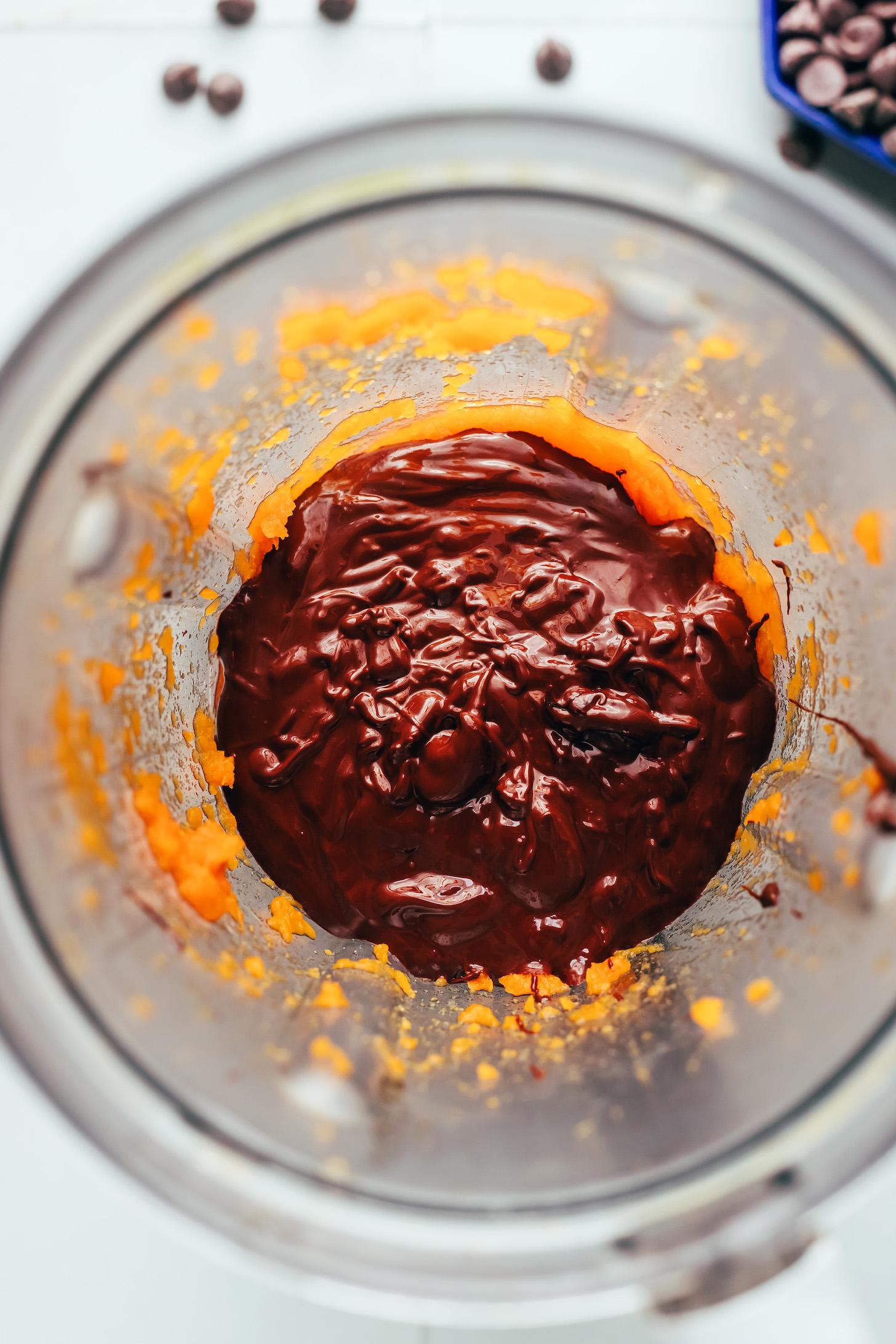 Melted dark chocolate and steamed sweet potato in a blender