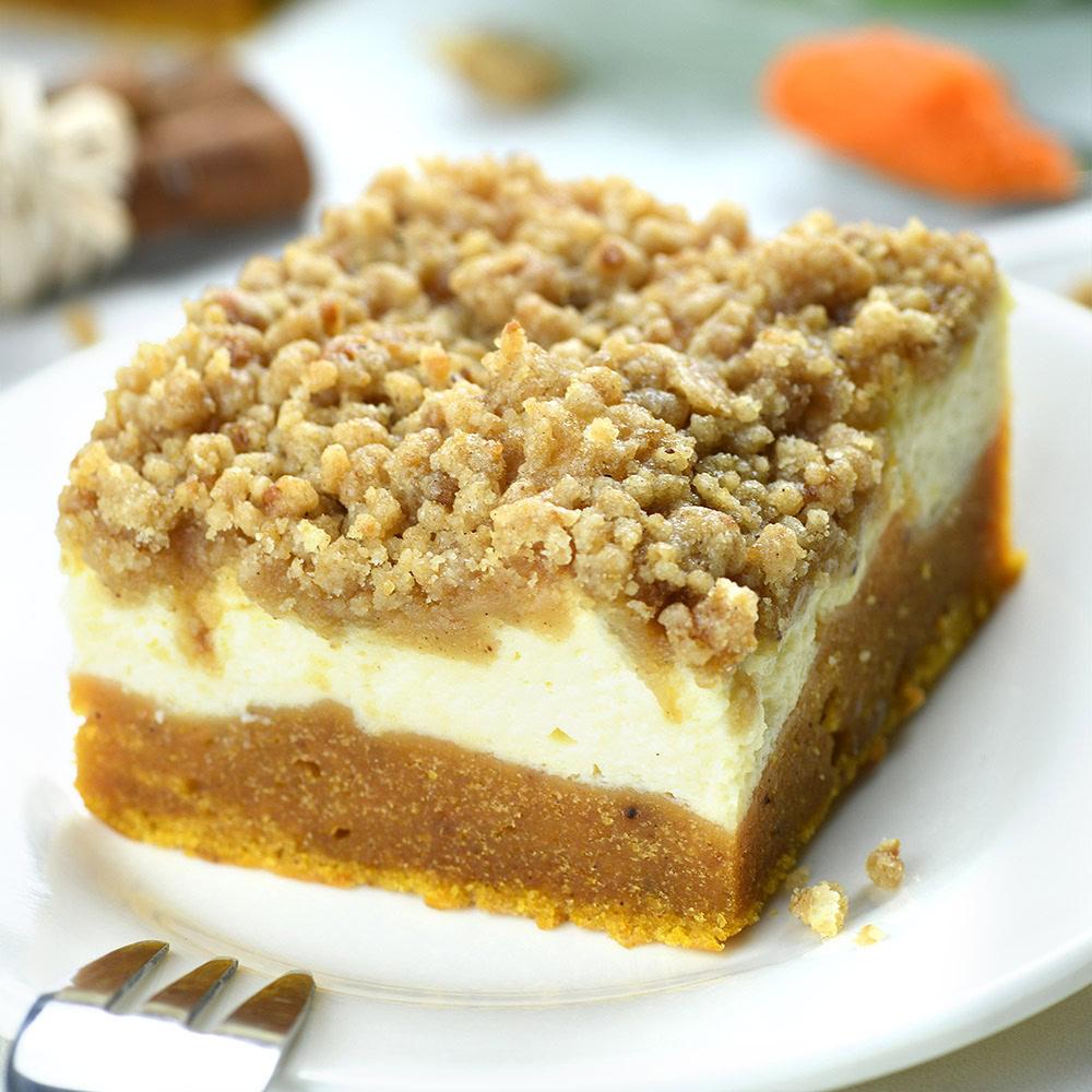 Piece of Pumpkin Cream Cheese Coffee Cake with streusel crumbs on the top.